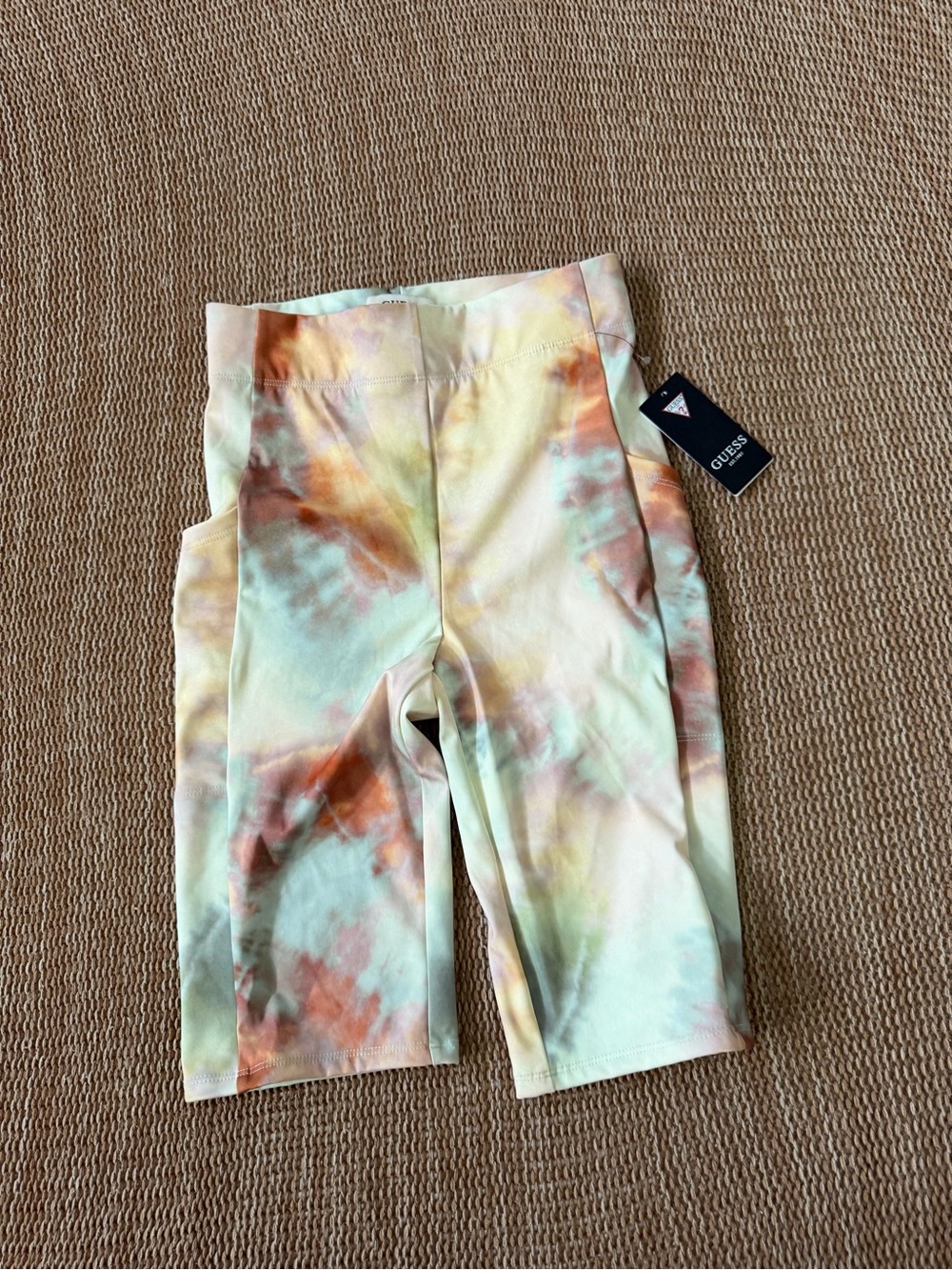 Guess Tie-Dye Bike Shorts in Pastel Green, Peach & Cream